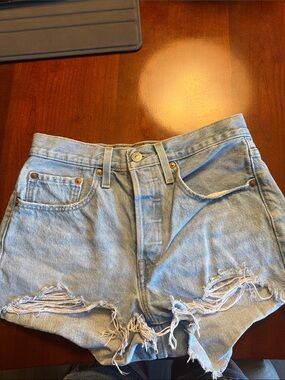 Levi's 501 high rise Light Blue Denim Jeans with White Lined Pocket. Like new